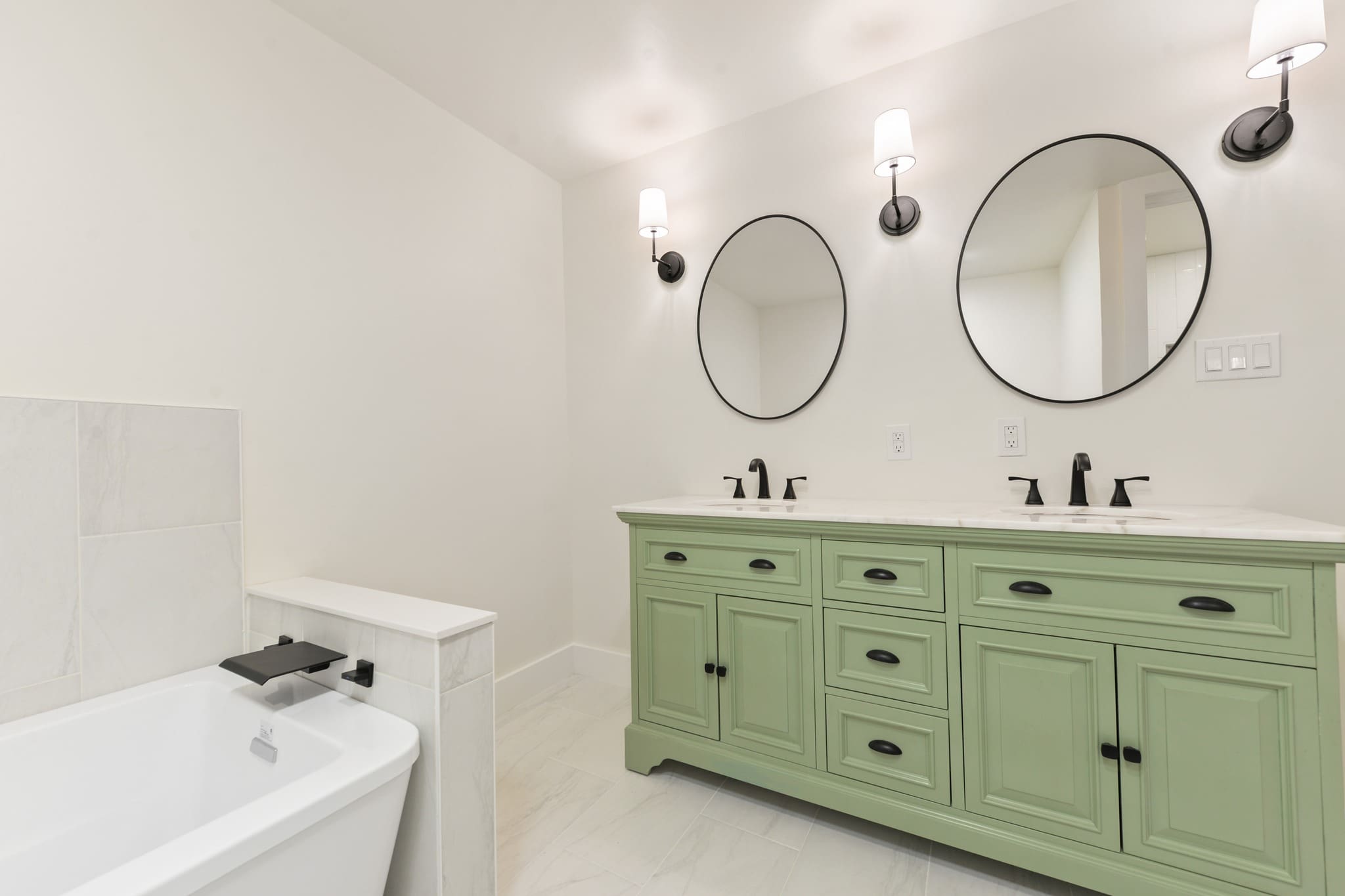 modern bathroom Bold open concept kitchen remodel with brass fixtures and blue accents